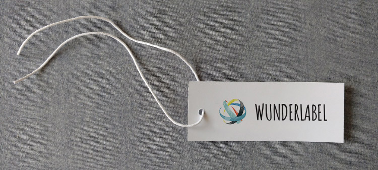 How to attach a hang tag with a loop hang tag with loop